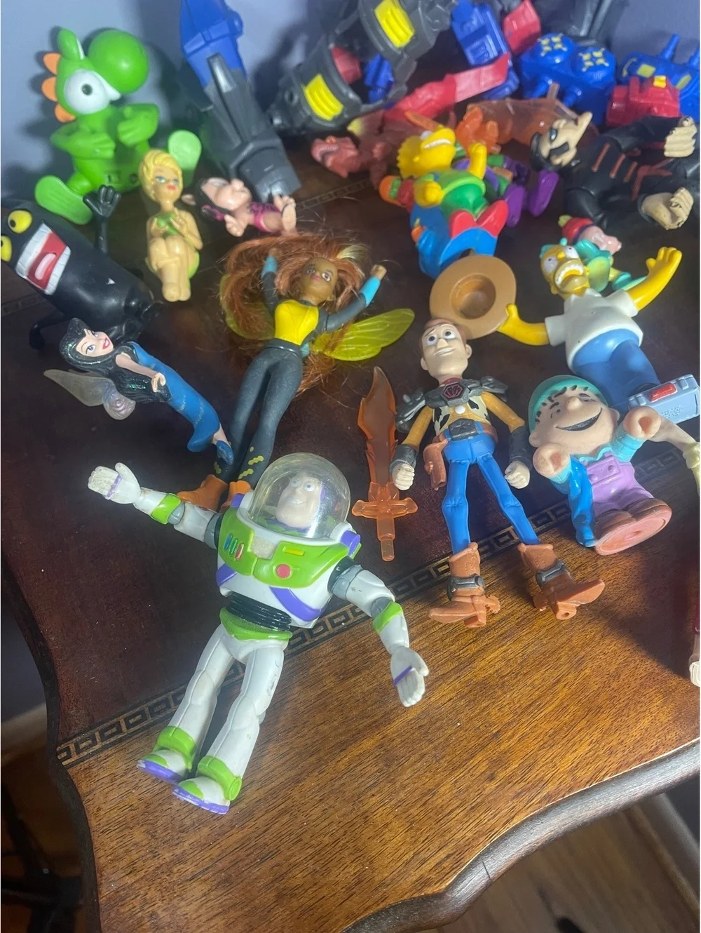Mixed Lot of Vintage and Modern Action Figures Including Transformers, Simpsons,